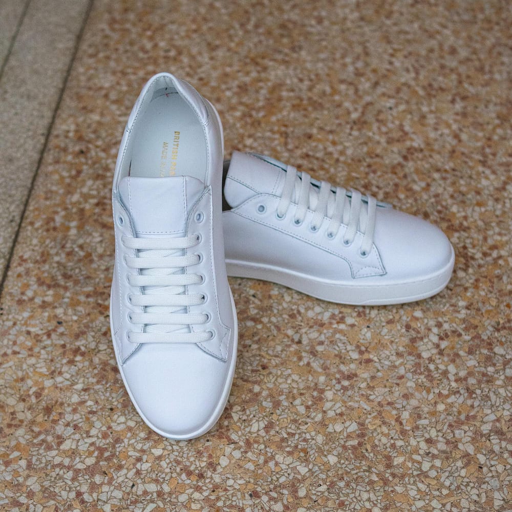 Classic White Calfskin Sneakers by British Passport. Front view 2.