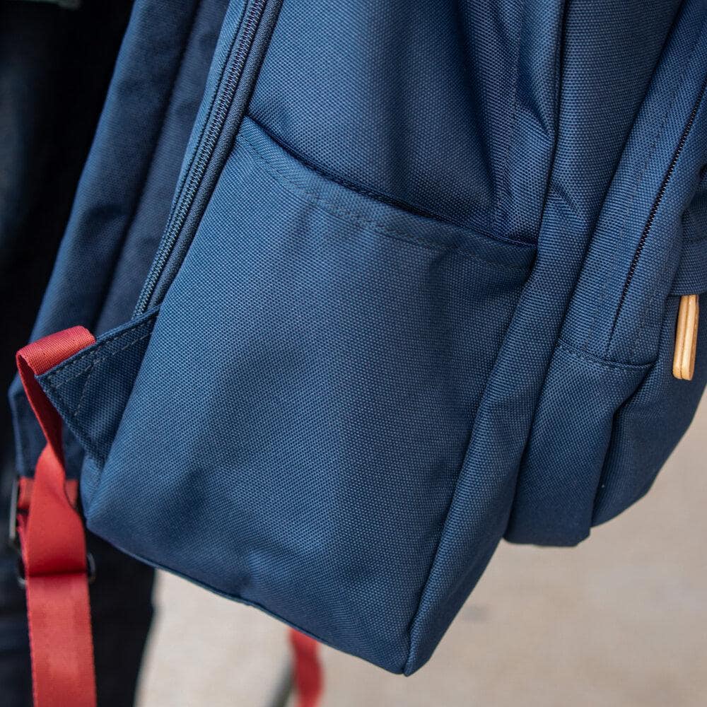 Maru Backpack by Harvest Label. Right exterior pocket view.