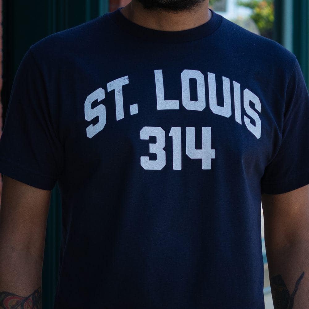 STL Area Code Tee in Navy. Close-up view.