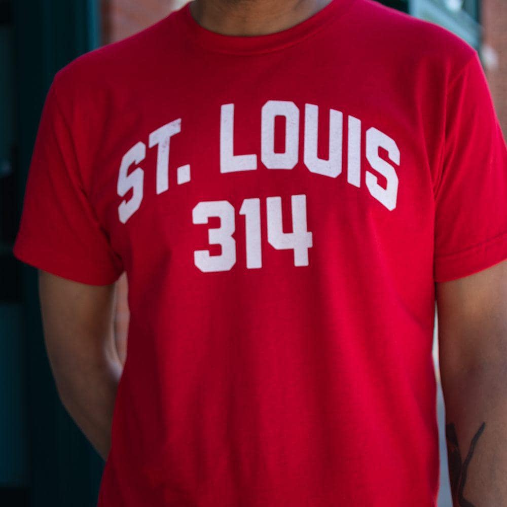 STL Area Code Tee in Red. Close-up view.