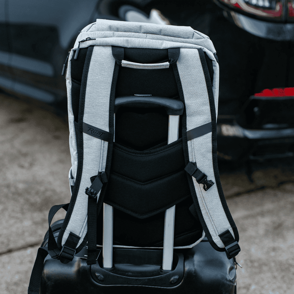 Paso 20L Backpack by Rupt in gray. Luggage pass-through view.